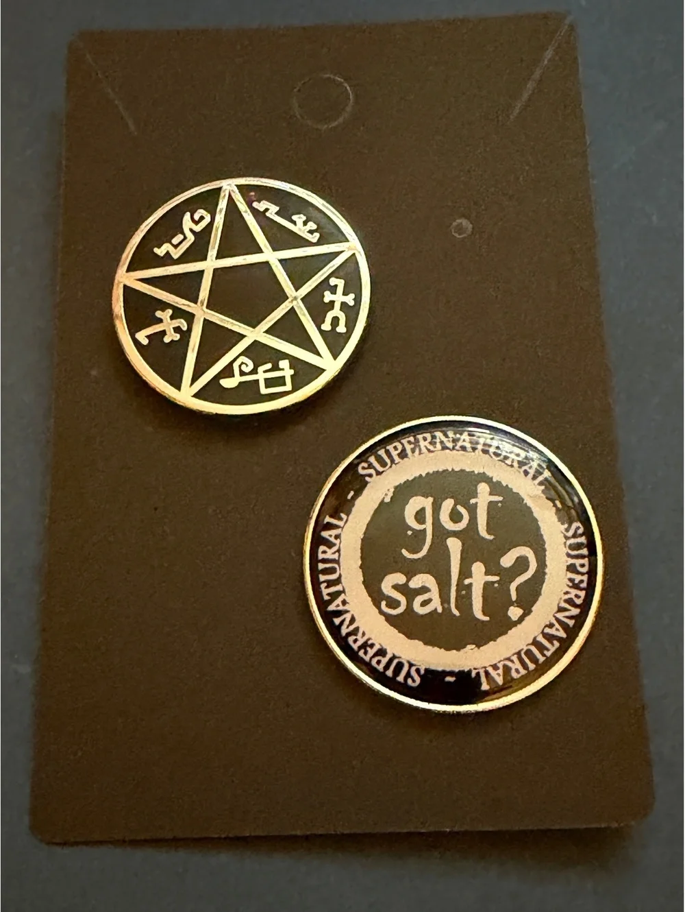 Pin set of 2. Supernatural Got Salt? & pentagram with symbols.